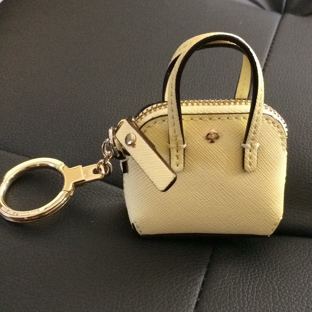 Hard to find yellow Kate Spade key fob !
